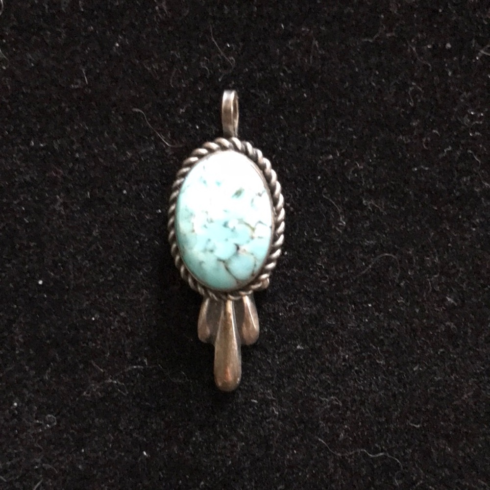 Turquoise Pendant with Silver like Accents